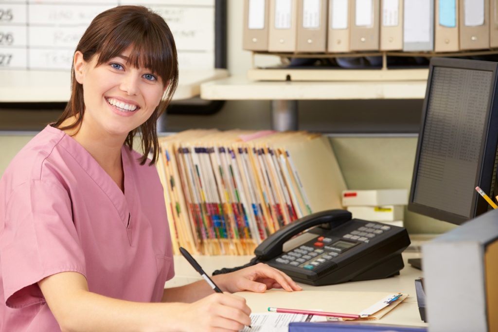 nurse at the front desk