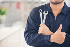 maintenance man giving a thumbs up