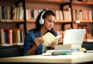 student studying in the library