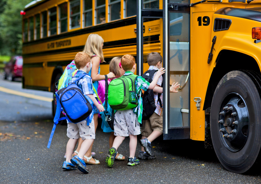 children entering the school bus