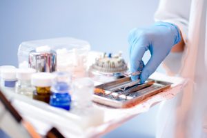 medical personnel performing a procedure